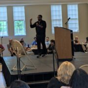 Ike Bailey speaking to the audience.