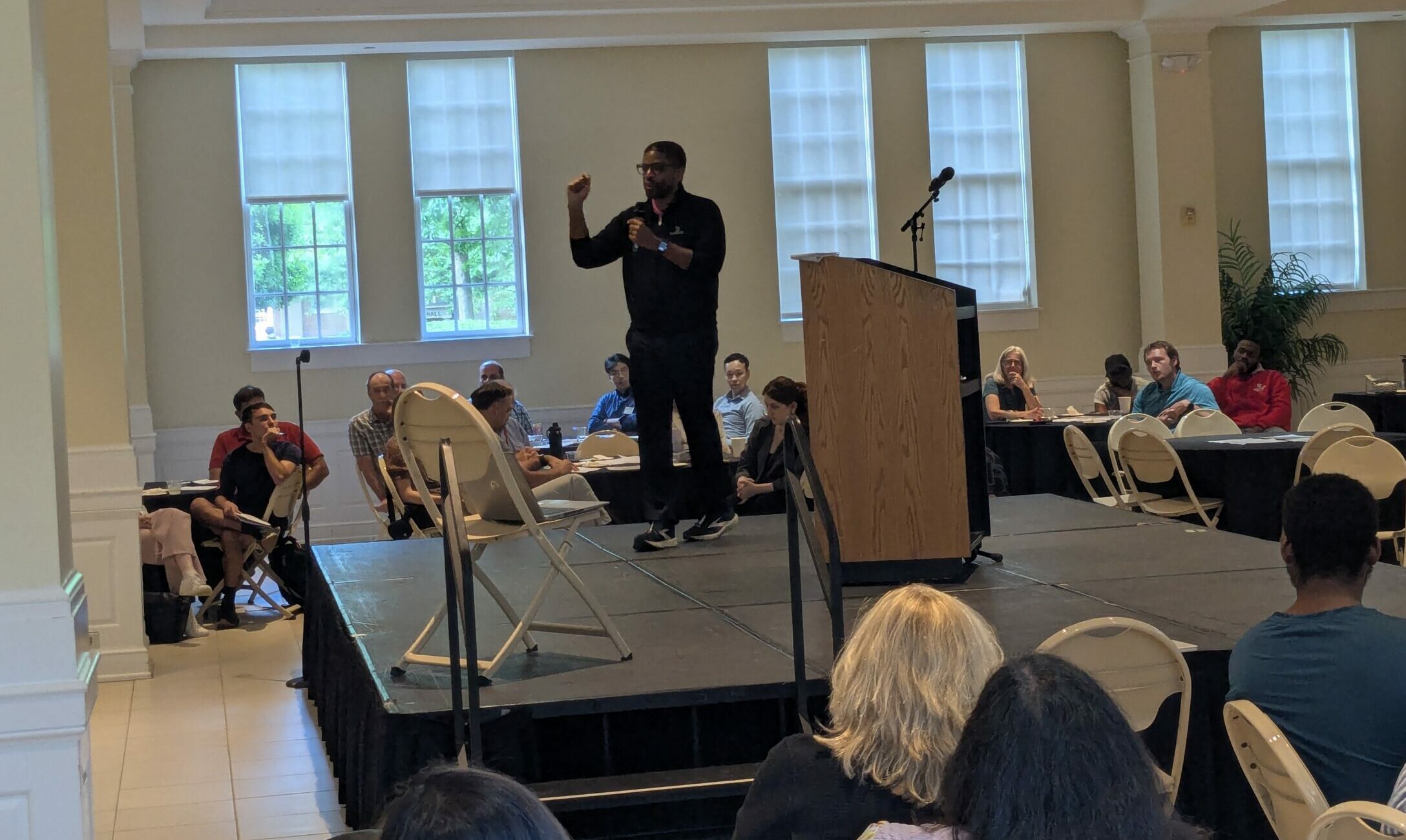 Ike Bailey speaking to the audience.