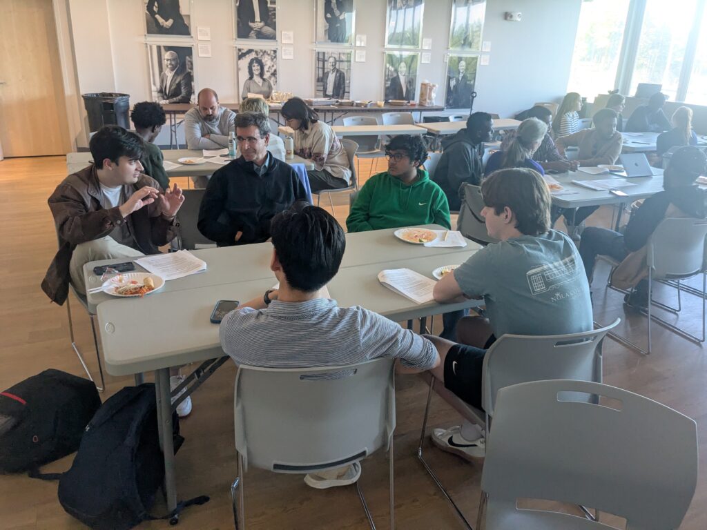 deliberation occurring around a square table