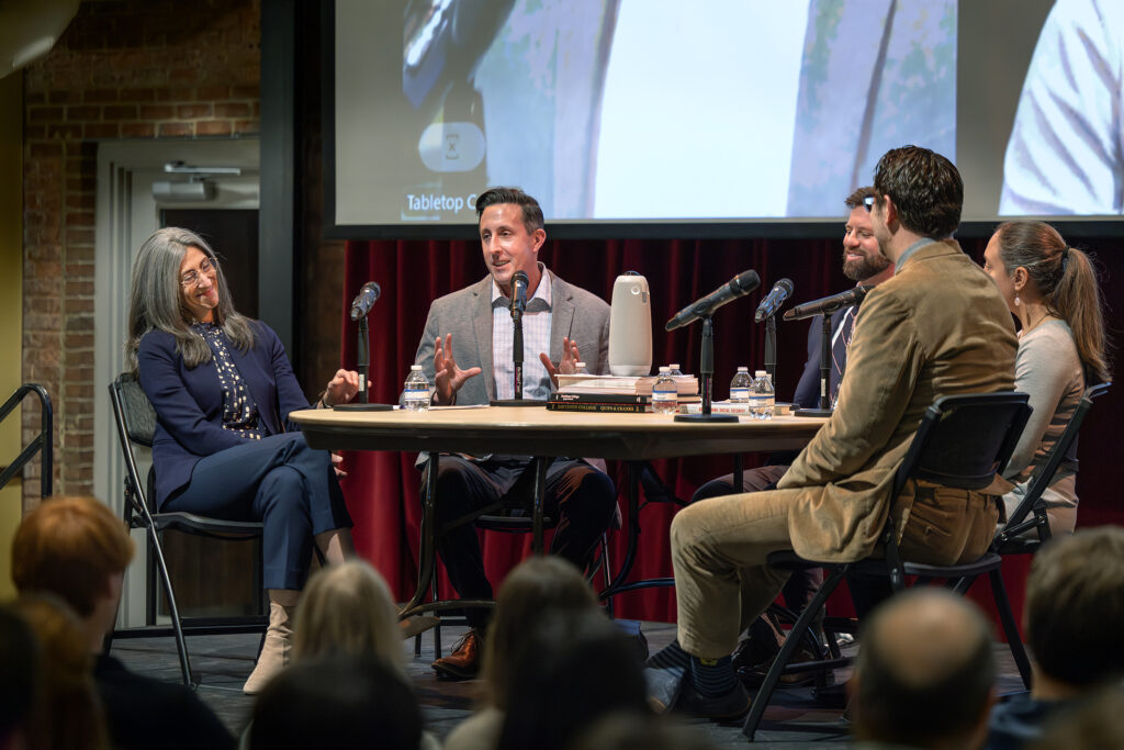 Panelists talking to each other